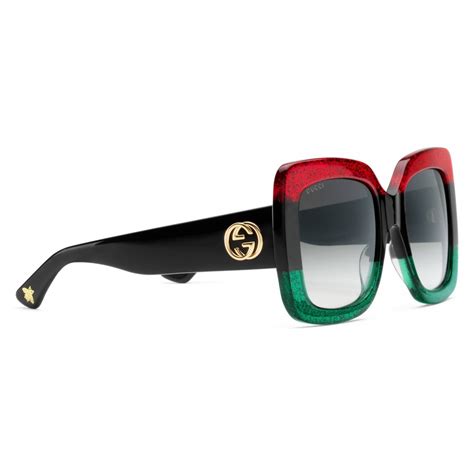 dark red gucci prescription sunglasses sparkly piece on arm